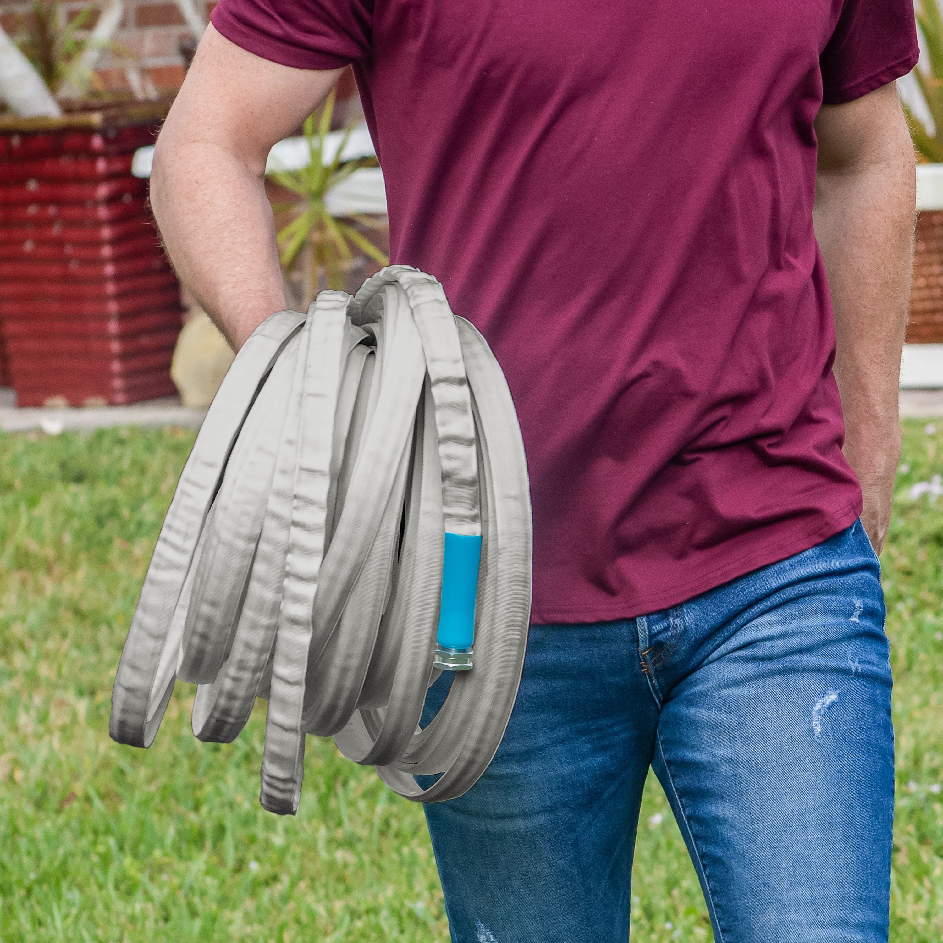 aqua joe fiberjacket hose being carried under one arm