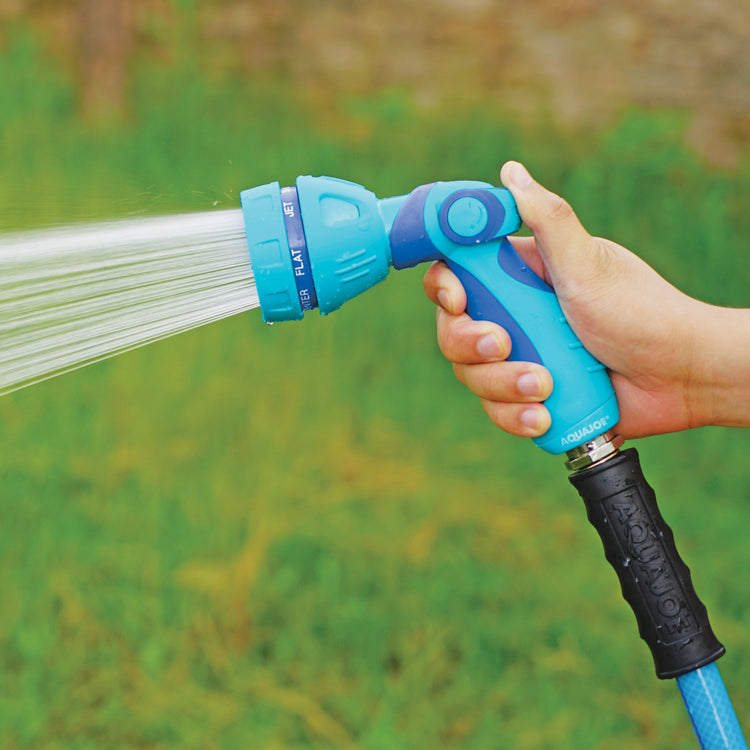 Person spraying water from the Aqua Joe Indestructible Series Non-Slip Grip Hose Nozzle.