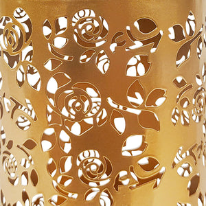 Close-up of the gold hand-painted finish and rose pattern.