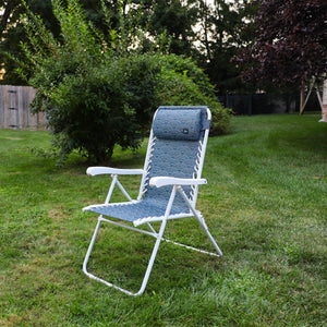 Angled view of the 26-inch Blue Scallop Reclining Sling Chair on a lawn.