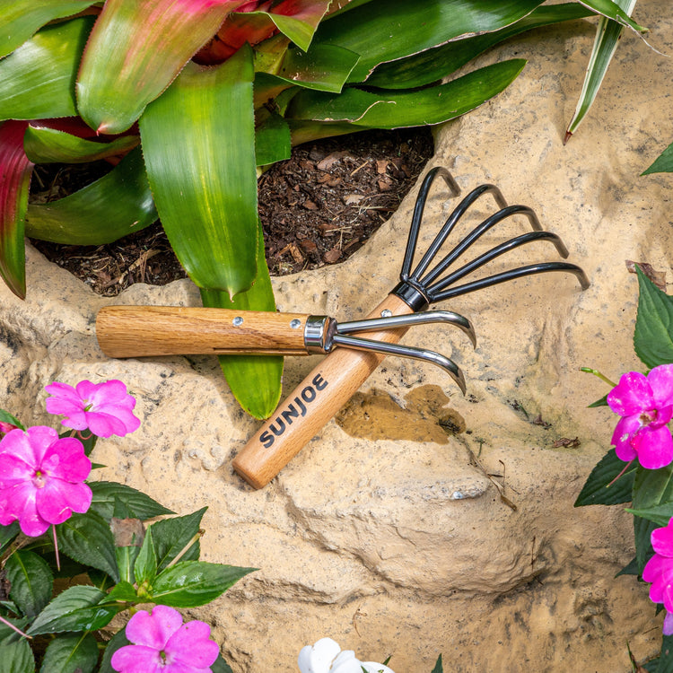 Nisaku Nekaki Nihondume Japanese Stainless Steel Double Claw Cultivator with a 5-prong cultivator.