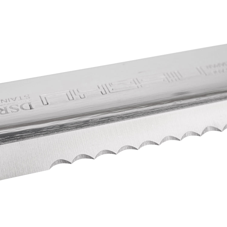 Close-up of the serrated edge on the Nisaku Limited Edition Stainless Steel Weeding Knife.