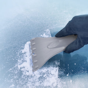 Snow Joe Telescoping gray Snow Broom and Ice Scraper being used to scrape ice off a window.